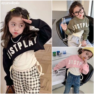 เสื้อยืดแขนยาวเด็กหญิง   ฤดูใบไม้ผลิและฤดูใบไม้ร่วงใหม่สไตล์เกาหลีแฟชั่นป้ายตัวอักษรเสื้อสเวตเตอร์แขนกุดด้านบนมีเชือกรูด
