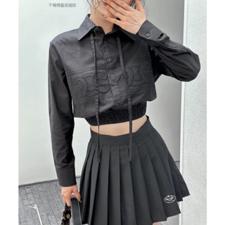 KOVE CEL 23 spring and summer New hollow-out carved Arc de Triomphe hem slimming shirt embroidered pleated skirt womens suit