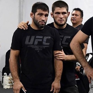 (แขนสั้นยอดนิยม) Ufc เสื้อยืดแขนสั้นลําลอง ผ้าฝ้าย พิมพ์ลาย สวมใส่สบาย สไตล์สปอร์ต พร้อมส่ง