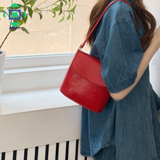 กระเป๋าแบบโฮมเมดสำหรับผู้หญิงสไตล์เกาหลี ins มีพื้นผิวแมทช์ลุคง่ายออกแบบเฉพาะกลุ่มกระเป๋าสะพายข้างสีแดง