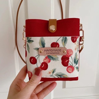 ​ Korean new 2023 satchel cherry cute change purse with clothes decoration bag headset bag oblique arm bag