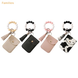 Families&gt; เคสหนัง สร้อยข้อมือ ประดับลูกปัดซิลิโคน ปอมปอม พร้อมพู่ และช่องใส่บัตร