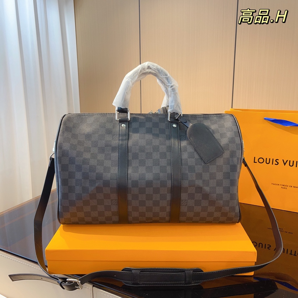 กระเป๋าหรูหราสําหรับผู้หญิง 11 L0UIS VUITT0N KEEPALL SERIES CHECKERED