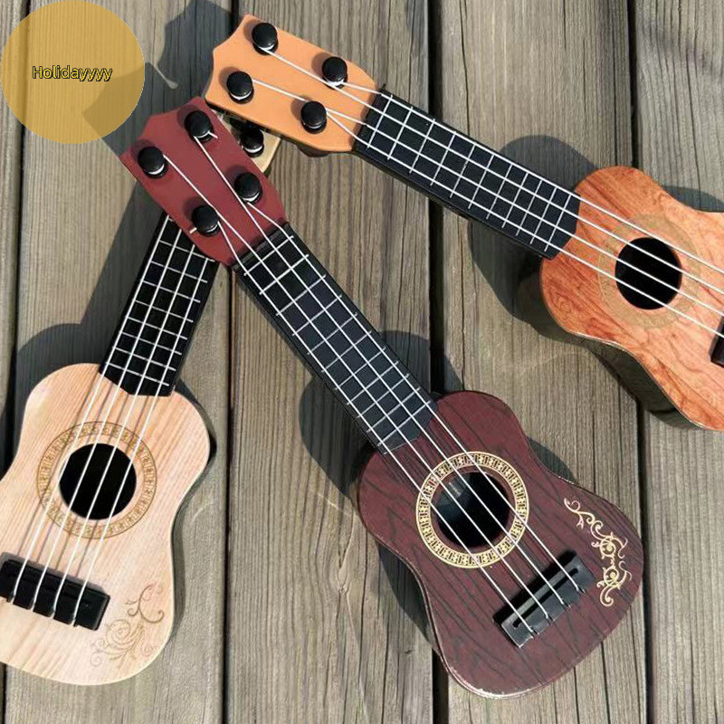 Holi 1PC 4 String Mini Guitarra เครื่องดนตรีของขวัญ Early Education ของ ...