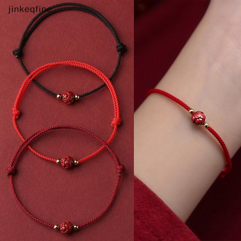 สร้อยข้อมือProtection Lucky Red String จากCinnabar Lotus และTitanium ...