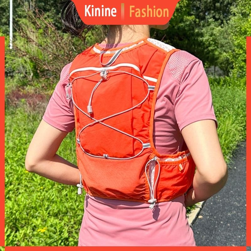 KIN Hydration Backpack สำหรับวิ่ง ขนาดใหญ่ กันน้ำ และมีถุงเก็บน้ำในตัว ...