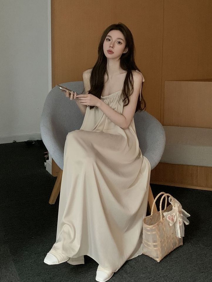 ชุดเชือกแขวนคอฝรั่งเศสผู้หญิงสไตล์ใหม่ลมเย็นเฉพาะกลุ่มหลวมกระโปรงรูปตัวaความรู้สึกสูงอารมณ์กลางยาวกระโปรง