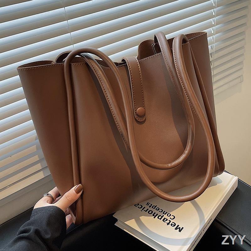 กระเป๋าผู้หญิงขนาดใหญ่ความจุขนาดใหญ่-2023-กระเป๋าสะพายเนื้ออินเทรนด์ใหม่ระดับ-high-end-กระเป๋าเดินทางเดินทาง