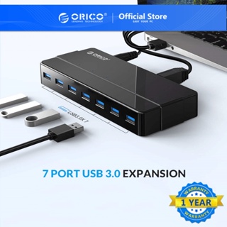 ภาพหน้าปกสินค้าOrico ฮับ USB 3.0 7 พอร์ต พร้อมอะแดปเตอร์พาวเวอร์ 12V ตัวแยก USB OTG สําหรับเดสก์ท็อป แล็ปท็อป คอมพิวเตอร์ PC (H7928-U3) ซึ่งคุณอาจชอบราคาและรีวิวของสินค้านี้