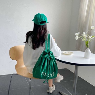 [new]กระเป๋าเป้สะพายหลังผู้หญิงมีเชือกรูดญี่ปุ่นและเกาหลีปักตัวอักษรถุงถังความจุขนาดใหญ่ DH002