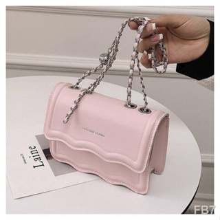 กระเป๋าผู้หญิง Niche Design Sense สีชมพู กระเป๋าแฟชั่นผู้หญิง 2023 สไตล์ใหม่ในปีนี้ กระเป๋าสะพายไหล่ข้างเดียว ยอดนิยม สไ