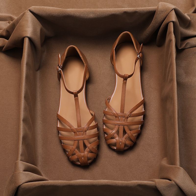 ราคาถูกyueyuejia-หนังย้อนยุคโรมัน-baotou-รองเท้าแตะผู้หญิง-2023-ฤดูใบไม้ผลิและฤดูร้อนใหม่ทอกลวงหนึ่งคำเข็มขัดรองเท้าแบน