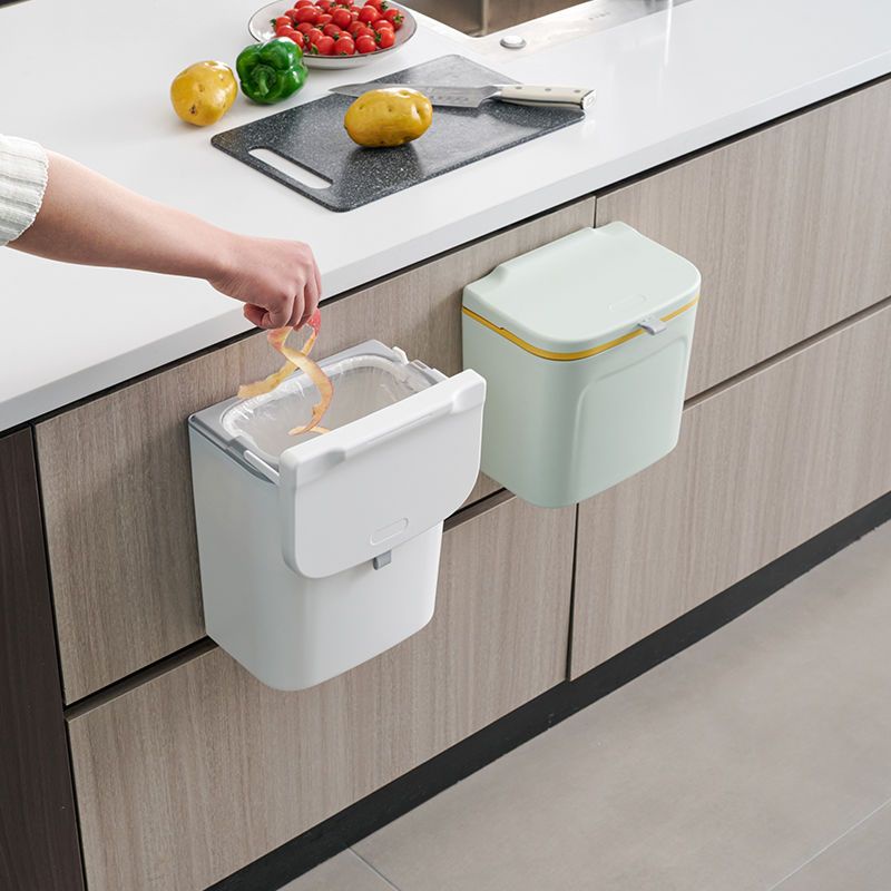 Wall-mounted trash can in the kitchen, cabinet door-mounted trash can