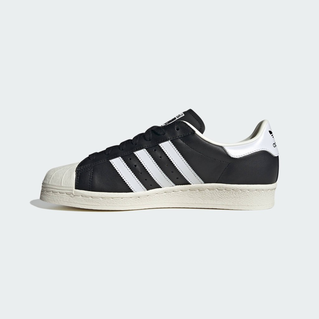 Adidas all black trainers 1980s store
