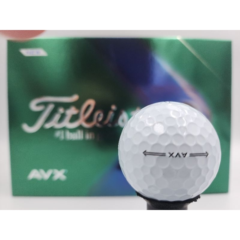 ภาพหน้าปกสินค้าลูกกอล์ฟNew Titleist AVX ตีไกลขึ้น ชอตลูกสั้นดีขึ้น และนุ่มนวลพิเศษ 1กล่องบรรจุ12ลูก (มีสีขาวและสีเหลือง)