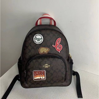 CE595 Coach Court Backpack In Signature Canvas With Ski Patches