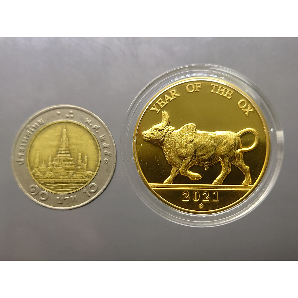 เหรียญนักษัตร-ทองแดงชุบกาหลั่ยทอง-ปีฉลู-พ-ศ-2564-กรมธนารักษ์สร้าง-ไม่ผ่านใช้