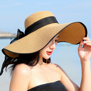 ภาพหน้าปกสินค้าMOJU หมวกสานผู้หญิง หมวกปีกกว้าง หมวกเที่ยวทะเล ขอบสีดำ โบว์สีดำ รุ่นA003 สีขาว ครีม กากี ที่เกี่ยวข้อง