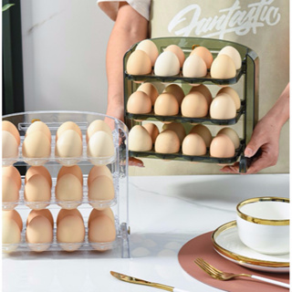 ตู้เย็นกล่องไข่ที่เรียบง่ายกล่องเก็บถาดไข่สร้างสรรค์ในครัวเรือนชั้นวางหลายชั้นพลิกถาดไข่ชั้นวางไข่