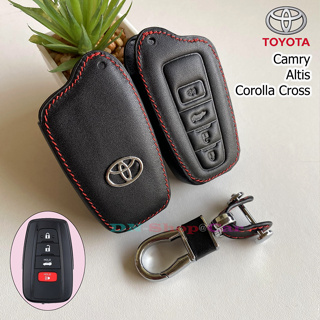 ภาพหน้าปกสินค้าซองหนังแท้ใส่กุญแจรีโมทรถยนต์ ปลอกหนังกุญแจ TOYOTA โตโยต้า รุ่น Corolla Cross / Camry / Altis 4ปุ่มกด ที่เกี่ยวข้อง