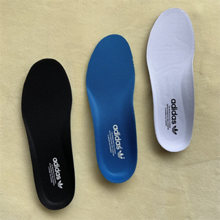 ภาพหน้าปกสินค้าการปรับตัว AdidasAdidasโคลเวอร์สมิธทองมาตรฐานเปลือกหอยรองเท้ากีฬาระบายอากาศชายและหญิงพื้นรองเท้า ที่เกี่ยวข้อง