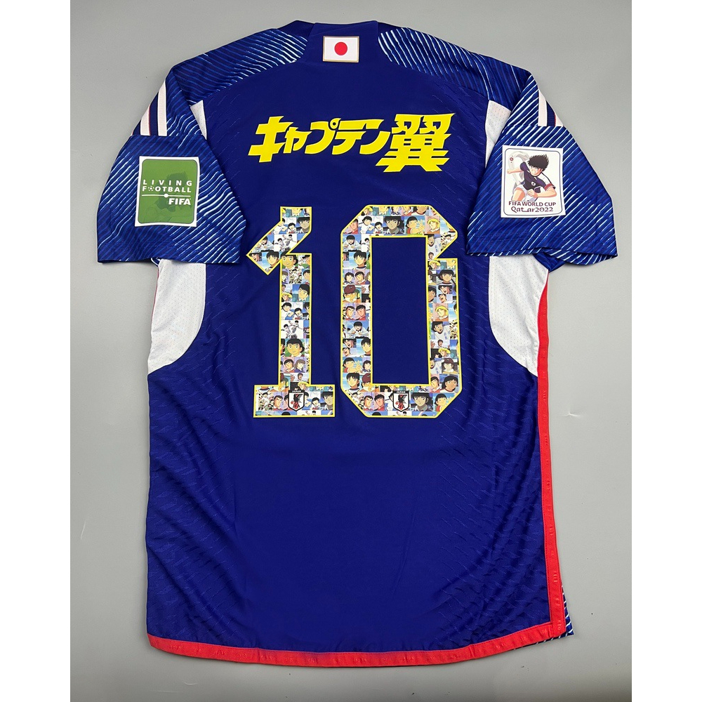 เสื้อบอล-เพลเย่อ-ทีมชาติ-ญี่ปุ่น-เหย้า-2022-23-player-japan-home-เบอร์ชื่ออาร์ม-การ์ตูน-10-tsubasa