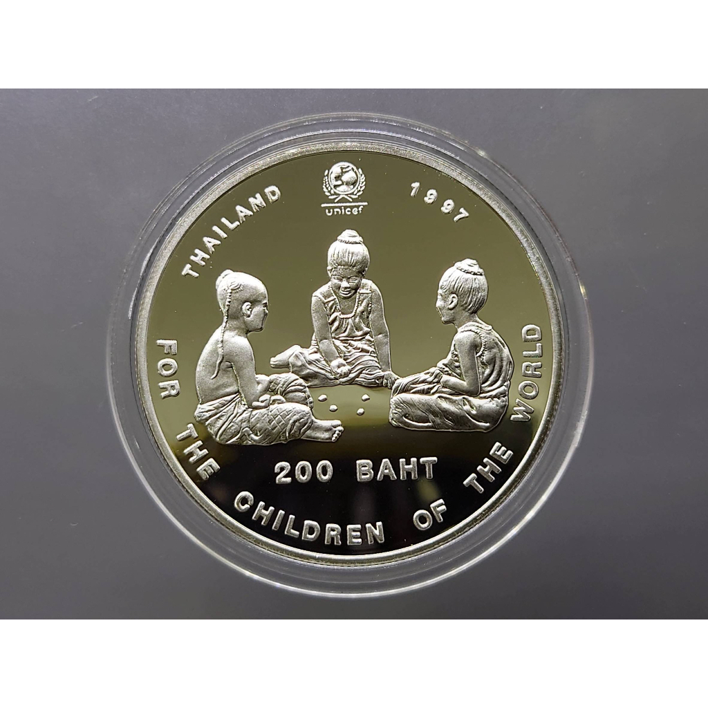 เหรียญเงินขัดเงา-200-บาท-เด็กเล่นหมากเก็บ-50-ปี-องค์การทุนเพื่อเด็กแห่งสหประชาชาติ-2540-พร้อมกล่อง-ใบเซอร์