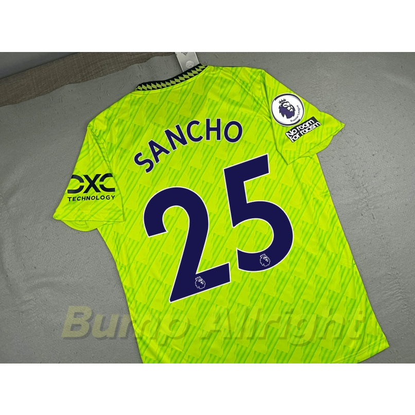 เสื้อฟุตบอล-แมนยู-เทิร์ด-mcu-2022-b-frenandes-sancho-eriksan-และอาร์มครบชุด