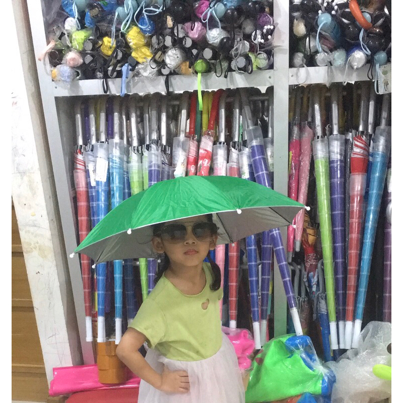 ภาพหน้าปกสินค้าร่มแบบหมวก กัน UV ใช้ได้ทั้งเด็กและผู้ใหญ่ มีหลายสีให้เลือก