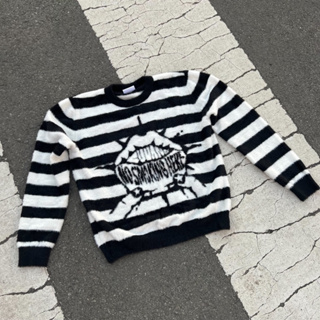 ‘NO SMOKING HERE’ striped sweater