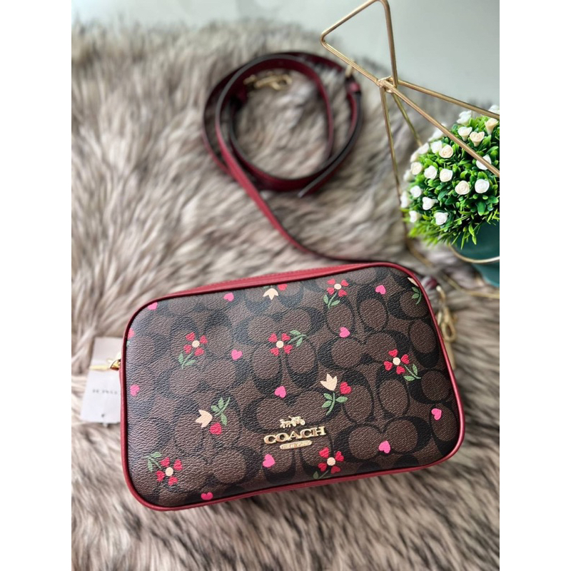 ผ่อน0-กระเป๋าสะพายข้าง-jes-crossbody-in-signature-canvas-with-heart-petal-print-coach-c7617-สีน้ำตาล-ลายดอกไม้