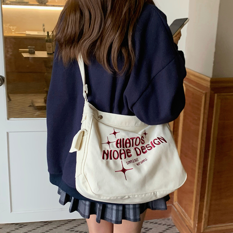 กระเป๋าร่อซู้ลวิทยาลัยกระเป๋าผ้าใบลมรุ่นเกาหลีนักเรียนทุกระดับชั้นความจุขนาดใหญ่เพื่อการพักผ่อน-navee