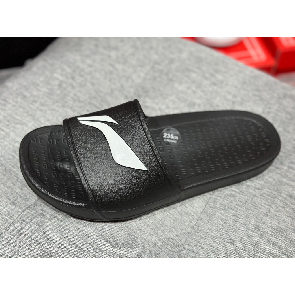 LW SHEARLING THONG SLIPPER IN LAPIS
