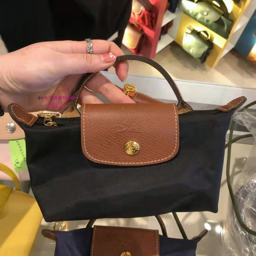 longchamp-pouch-with-handle-le-pliage-mini-กระเป๋าถือ-handbag-กระเป๋าใส่เหรียญ-แบรนด์เนม