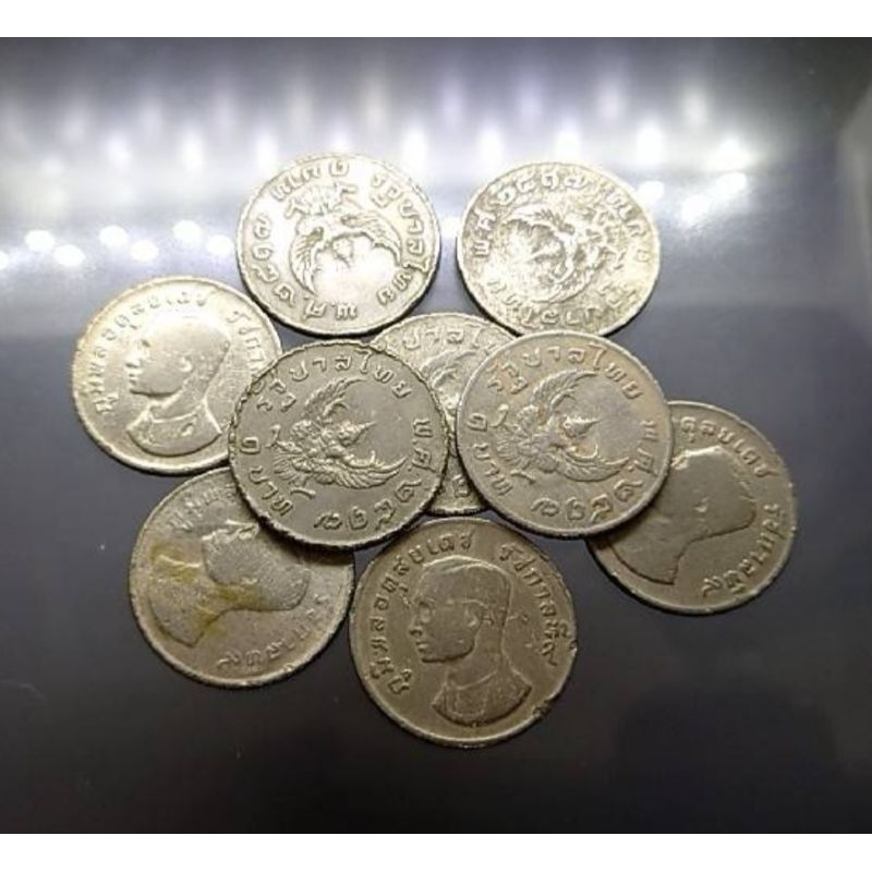 เหรียญ-1-บาท-หลังครุฑ-ร9-ปี-พศ-2517-ผ่านใช้-มีบิ่น-ราคาต่อ-1-เหรียญ-ของสะสม-เหรียญครุฑ