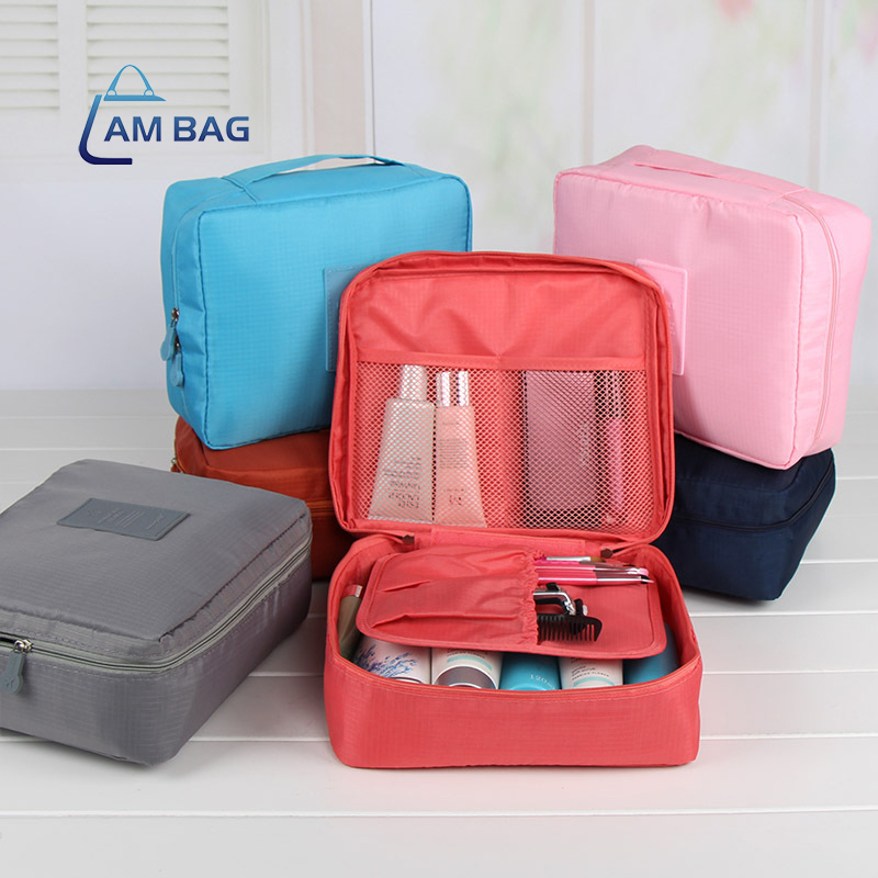 ภาพหน้าปกสินค้าAmBag ให้เลือก 9 สี กระเป๋าจัดเก็บระเบียบพกพา กันกระแทกในการเดินทาง ใส่เครื่องสำอางค์ ของใช้ต่างๆ กันน้ำซิปคู่