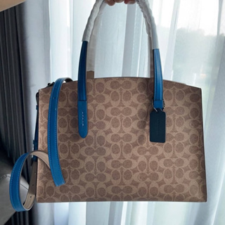 (ผ่อน0%) กระเป๋าสะพายข้าง Coach 69481 Charlie Carryall in Colorblock Signature Canvas ลายซีสีน้ำตาล สายสีน้ำเงิน งานshop