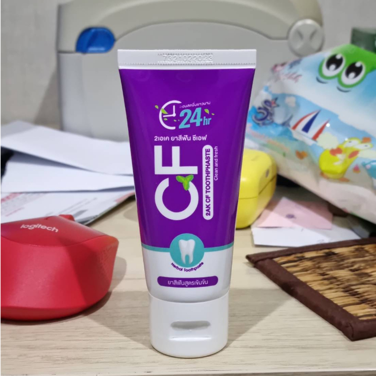 รูปภาพของส่งฟรี ของแท้100% ยาสีฟันcf แก้ปวดฟัน ฟันโยก หินปูน เหงือกบวม ยาสีฟันสีม่วง CFยาสีฟันลองเช็คราคา