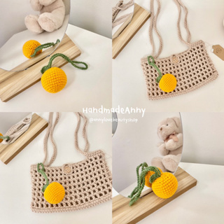 ภาพหน้าปกสินค้าHandmade 🍊 ที่ห้อยกระเป๋าถักไหมพรม น้องส้ม 🍊🍊 ที่เกี่ยวข้อง