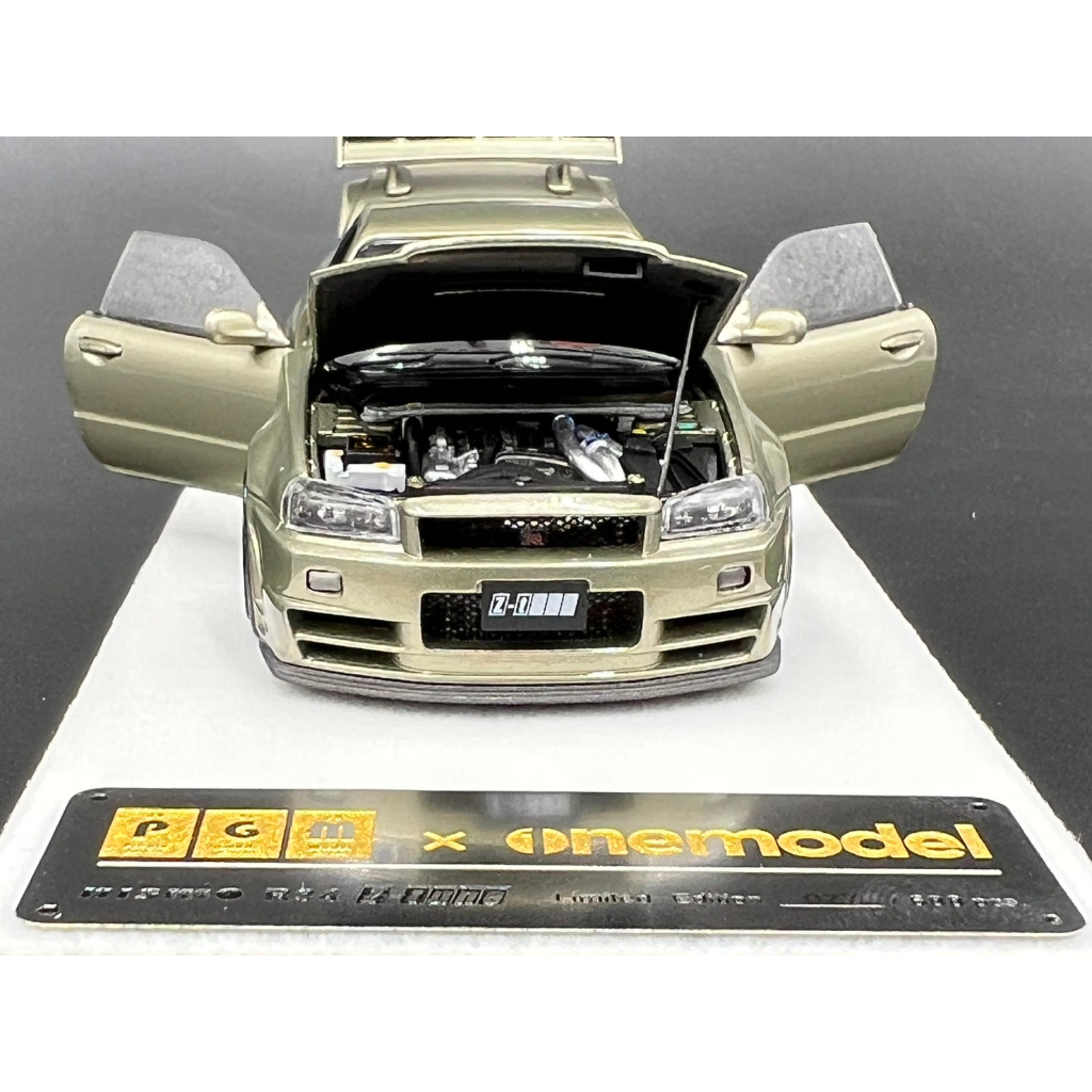 pgm-x-one-model-1-43-limited-edition-688-pcs-nissan-licensed-product-r34-z-tune-jade-green-diecast-fully-opened-fr