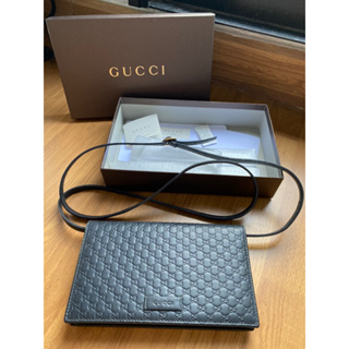 Used Gucci wallet on strap