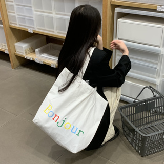 AMILA ins กระเป๋าสะพายไหล่สีทึบฤดูร้อนสไตล์เกาหลีกระเป๋าผ้าใบเรียบง่ายกระเป๋านักเรียนระดับวิทยาลัย