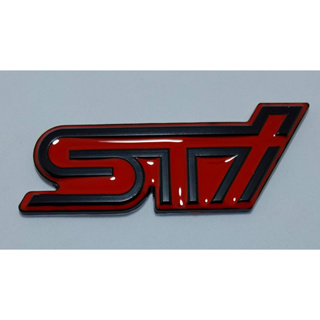 LOGO Subaru Sti โลโก้ซูบารุ เอสทีไอ สีดำแดง สีเงินแดง สติกเกอร์โลหะ ติดท้ายรถยนต์  ขนาด สูง 3 cm. ยาว 9 cm.