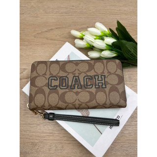 (ผ่อน0%) กระเป๋าสตางค์ซิปรอบ มีสายคล้อง COACH CB856 LONG ZIP AROUND WALLET ลายซีสีน้ำตาล 7 นิ้ว