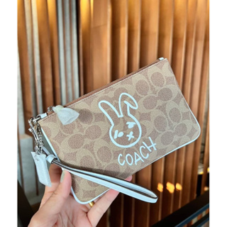 COACH SMALL WRISTLET WITH RABBIT