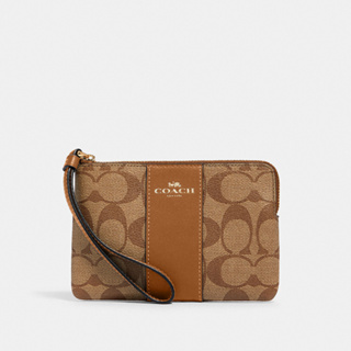 Coach 58035 Corner Zip Wristlet In Signature Canvas (IMNLJ) กระเป๋าคล้องมือ สี Im/Lt Khaki/Lt Saddle