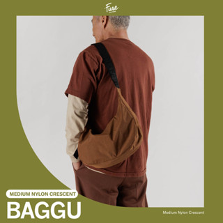 ภาพหน้าปกสินค้าพร้อมส่ง BAGGU Medium Nylon Crescent Bag กระเป๋าผ้าสะพายข้าง ซึ่งคุณอาจชอบราคาและรีวิวของสินค้านี้