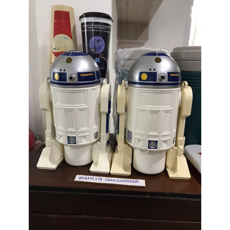 ขายเหมา-แก้วน้ำโรงหนัง-r2d2-ไม่มีสายไม่มีหลอดมานะครับ-ตัวขวาขาเหลือง-สูง10นิ้ว-ราคา-1-100