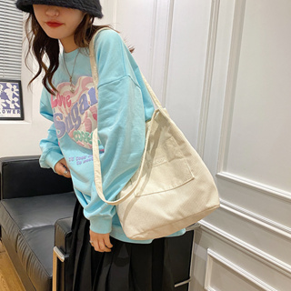 ANACAMI🎀พร้อมส่ง🎀 กระเป๋าสะพายข้าง กระเป๋าผ้าลูกฟูก น่ารักมาก สไตล์เกาหลี มีให้เลือก 4 สี นุ่มนิ่ม สะพายไปเรียน ไปเที่ยว