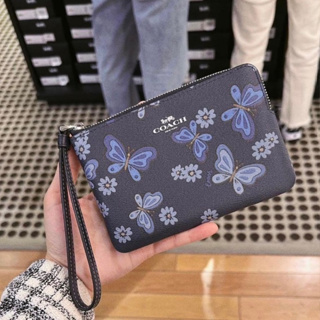 พร้อมส่ง แท้ 🇺🇸💯% Coach คล้องมือ 1 ซิป S ลายใหม่CORNER ZIP WRISTLET WITH LOVELY BUTTERFLY PRINT (COACH CH716)